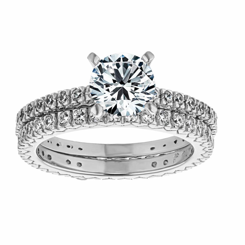 Marilyn Engagement Ring shown with a 1.0ct radiant cut Lab-Grown Diamond with recycled diamonds that go approximately 3/4 around the slightly squared band in recycled 14K white gold. Wedding band can be purchased together at a discount. 