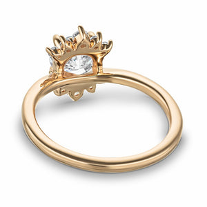 Nature inspired engagement ring with floral diamond halo design featuring 1ct round cut lab grown diamond in 14k rose gold