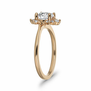 Nature inspired engagement ring with floral diamond halo design featuring 1ct round cut lab grown diamond in 14k rose gold