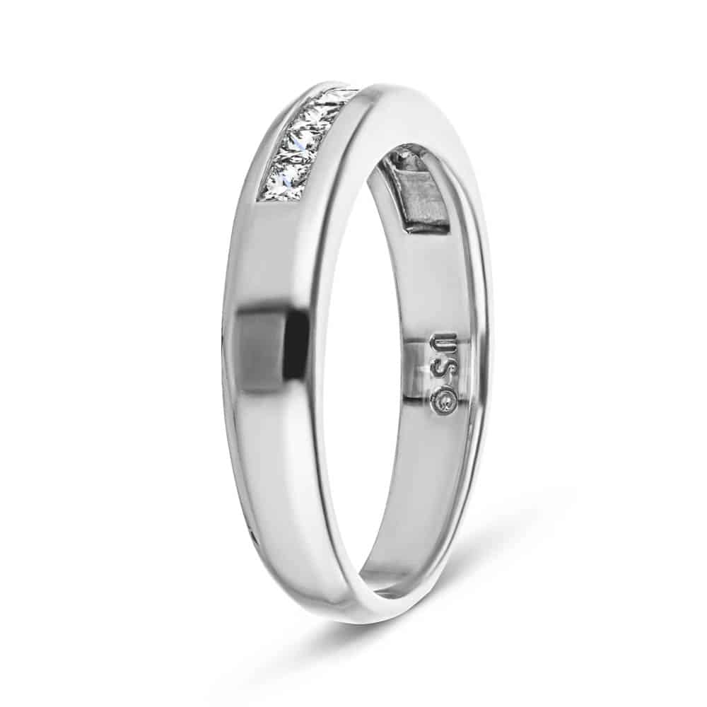 Channel set diamond accented wedding band in recycled 14K white gold 