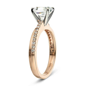 Pave set diamond accented engagement ring with asymmetrical design set with 1.5ct oval cut lab grown diamond center stone in 14k rose gold band shown from side