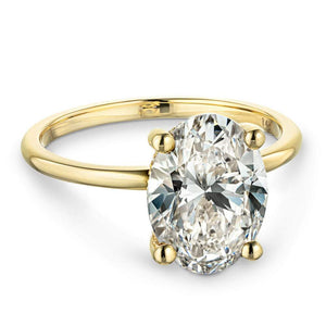Elegant hidden halo engagement ring with 4 prong set 3ct oval cut lab grown diamond in thin 14k yellow gold band