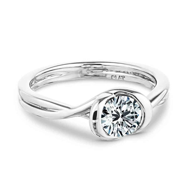 Shown with 1ct Round Cut Lab Grown Diamond in Platinum|Unique contemporary solitaire engagement ring with twisted band design holding a 1ct round cut lab grown diamond in platinum setting