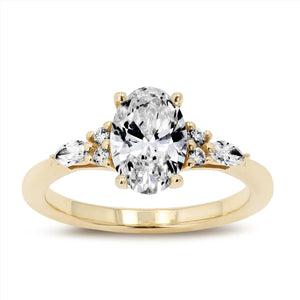 Diamond accented engagement ring with a 1ct oval cut lab grown diamond set in 14k yellow gold