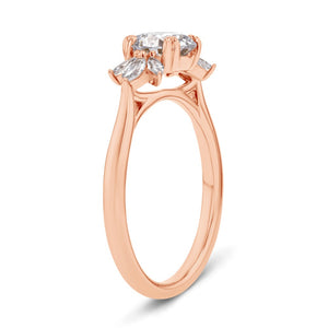 floral inspired diamond accented engagement ring with round cut lab grown diamond center stone set in 14k rose gold metal