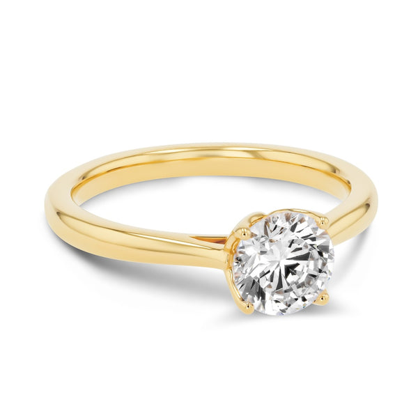 Shown here with a 1.0ct Round Cut Lab Grown Diamond center stone in 14K Yellow Gold|solitaire engagement ring with nature inspired floral prong head with lab grown diamond center stone set in 14k yellow gold metal