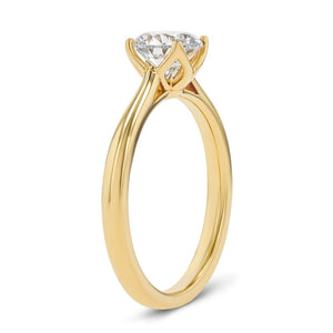 solitaire engagement ring with nature inspired floral prong head with lab grown diamond center stone set in 14k yellow gold metal
