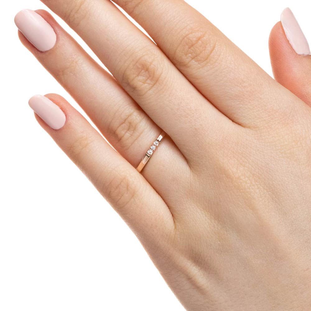 Three Stone French-Set Band set with 0.04ctw lab-grown diamonds shown in recycled 10K rose gold 