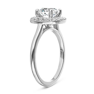 Vintage style cushion shape diamond halo engagement ring with 1.5ct round cut lab grown diamond in 14k white gold band shown from side