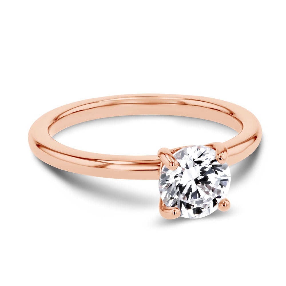 Shown here with a 1.0ct Round Cut Lab Grown Diamond center stone in 14K Rose Gold|shown with 1 carat lab grown diamond center stone with nature inspired floral prong head set in 14k rose gold
