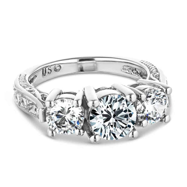 Shown with 3 Round Cut Lab Grown Diamonds in 14k White Gold|Unique vintage style three stone engagement ring with round cut lab grown diamonds in 14k white gold band with filigree detailing