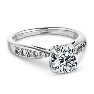 Beautiful channel set diamond accented engagement ring with 1ct round cut lab grown diamond and peek-a-boo diamonds in 14k white gold band