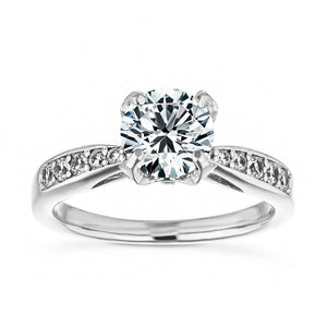Unique channel set diamond accented engagement ring with 1ct round cut lab grown diamond and peek-a-boo diamonds in 14k white gold setting