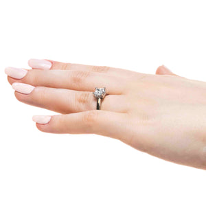 Hidden halo engagement ring with 1ct princess cut lab grown diamond in 14k white gold band worn on hand sideview