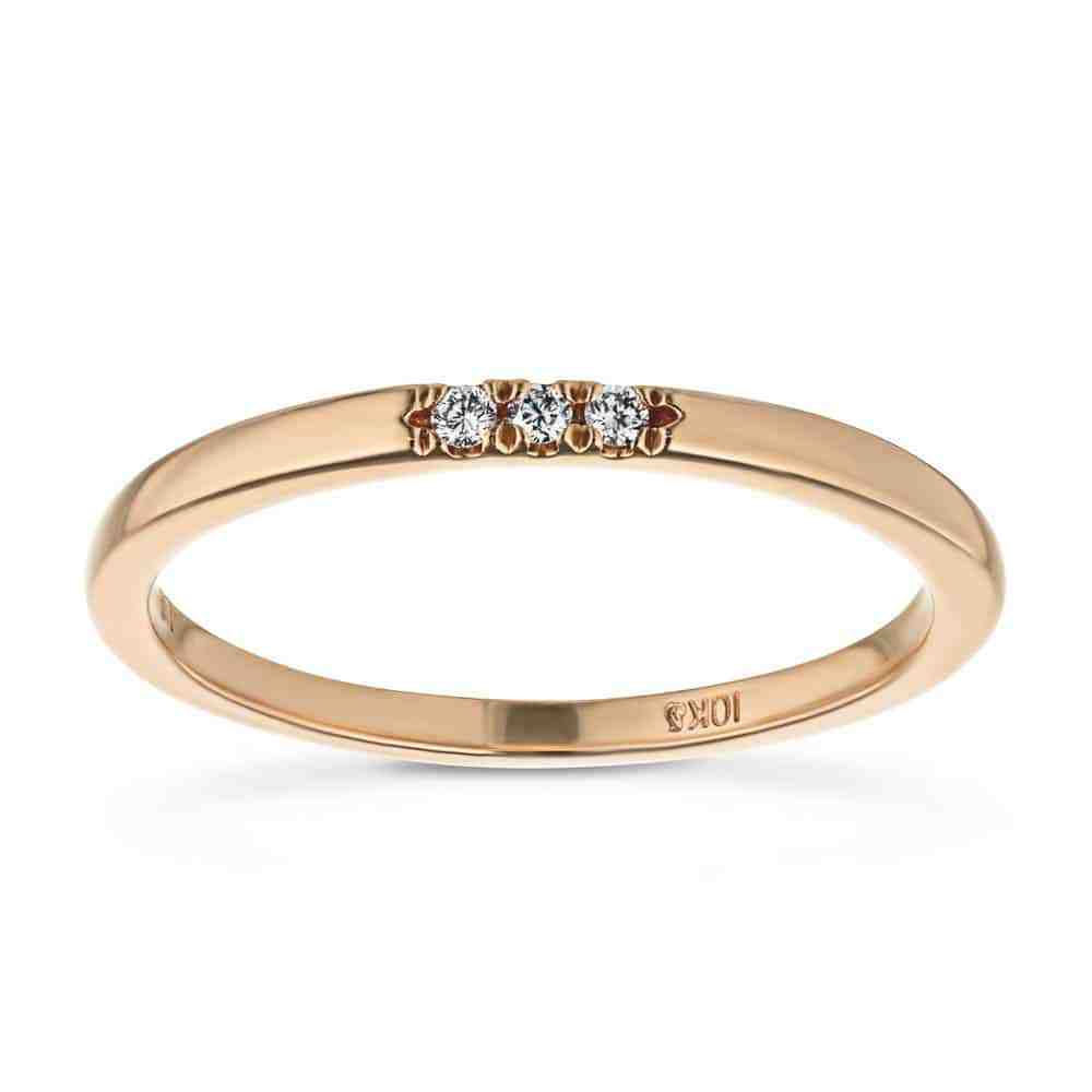 Three Lab-Grown Diamonds set in a simple band in recycled 10K rose gold, can be purchased as a set for a discounted price