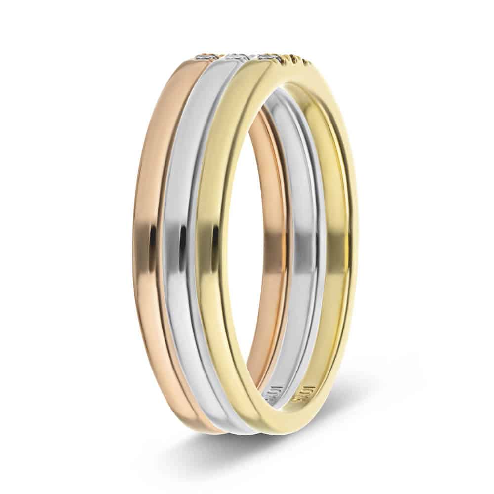 Three Lab-Grown Diamonds set in a simple band in recycled 10K rose gold, 10K white gold and 10K yellow gold, can be purchased as a set for a discounted price