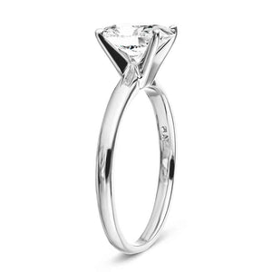 Traditional solitaire engagement ring with 2ct emerald cut lab grown diamond in platinum shown from side