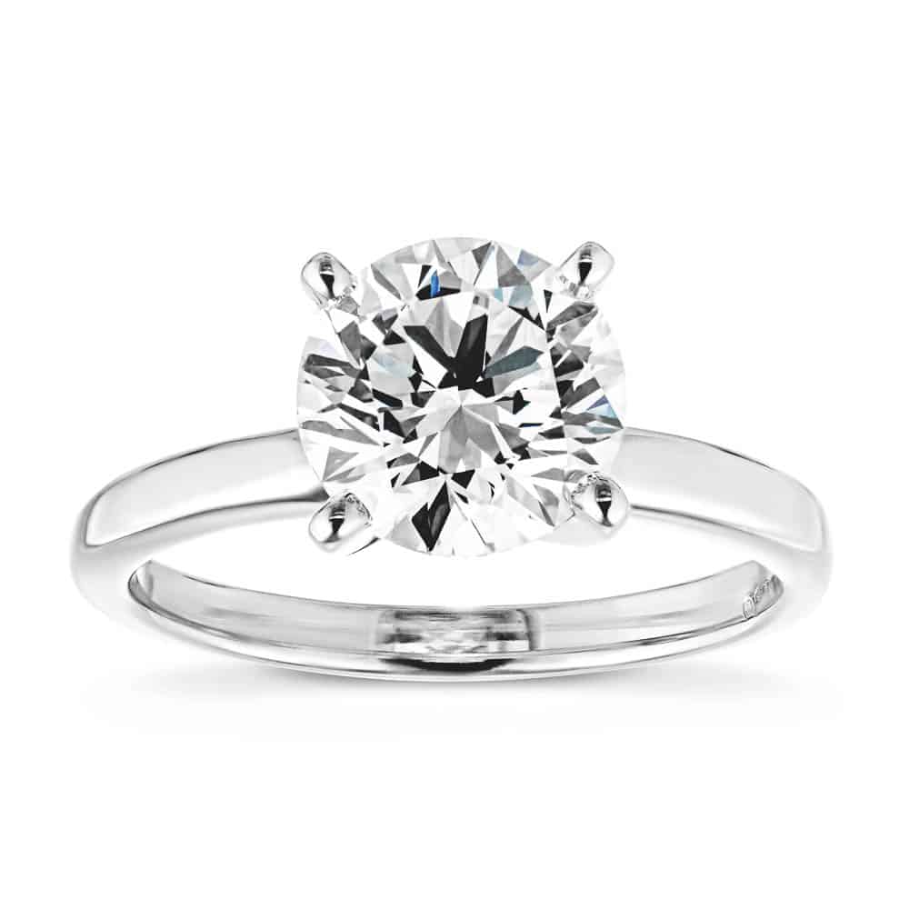 Traditional Solitaire Engagement Ring shown with a 1.5ct round cut in 14K white gold 