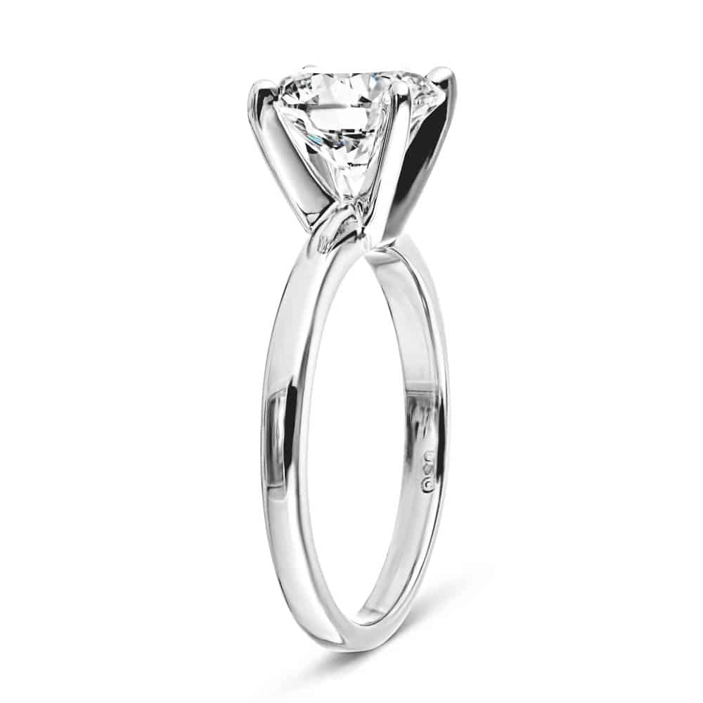 Shown with a 2.0ct Round cut in 14KW, 4 Prong