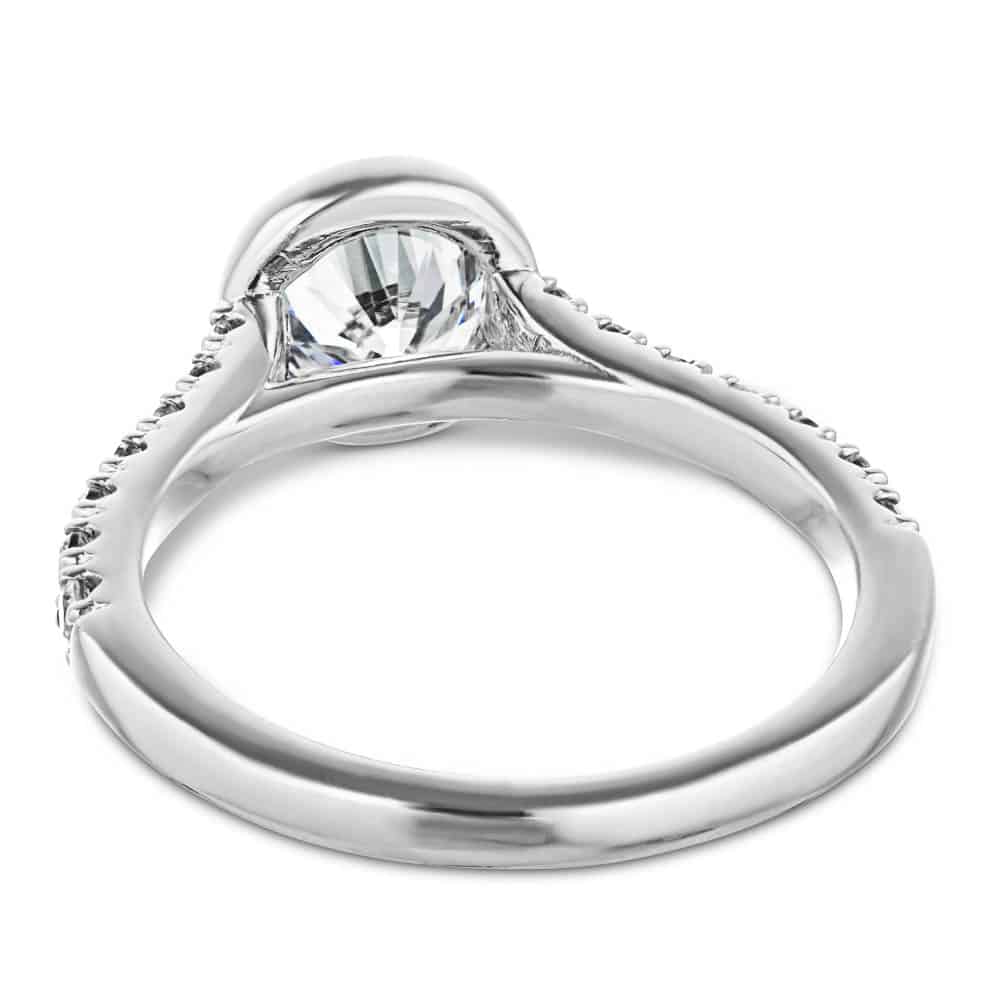 Shown with a bezel set 1.0ct Round cut Lab-Grown Diamond with accenting stones on the band in recycled 14K white gold 