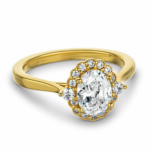 Vintage and antique style engagement ring with floral style diamond halo and a 1ct oval cut lab grown diamond in 14k yellow gold