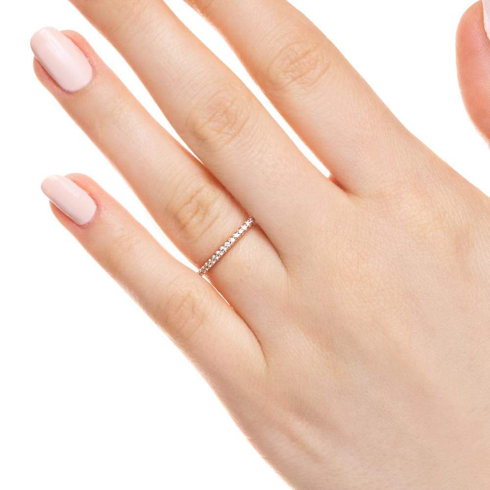 Stackable single band with 0.13ctw lab-grown diamonds shown in 10K yellow gold; also available in 10K rose gold or 10K white gold, or purchase all three at a discount. 