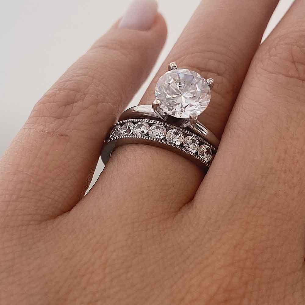 2.0ctw lab-grown diamond milgrain eternity band shown here with our Traditional Engagement Ring 